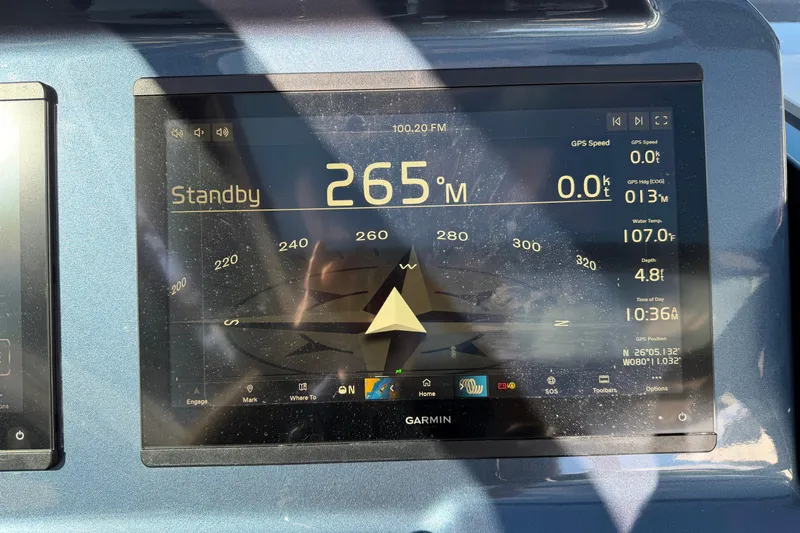  Yacht Photos Pics Garmin navigation display on 2022 Vanquish VQ45 showing standby mode and GPS data.