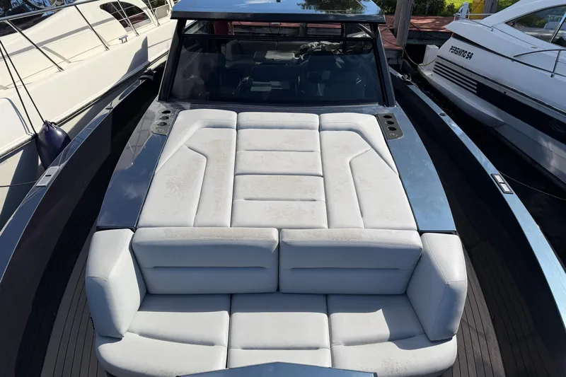  Yacht Photos Pics 2022 Vanquish VQ45 luxury yacht with sleek design and spacious seating area.