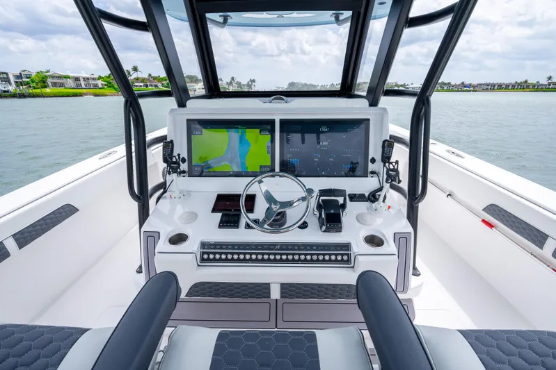 Kroppdustr Yacht Photos Pics 2023 Invincible 37 Catamaran helm with advanced navigation displays and controls.