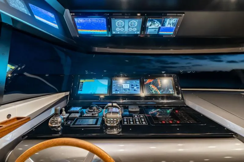  Yacht Photos Pics Control panel of 2021 Sanlorenzo SX76 yacht with advanced navigation displays.