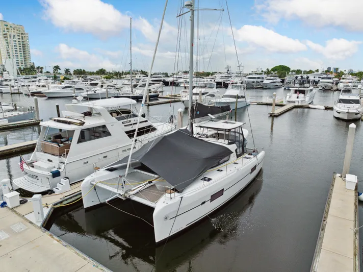 Neptune's Waters Yacht Photos Pics 2019 Lagoon 42 catamaran docked in marina.