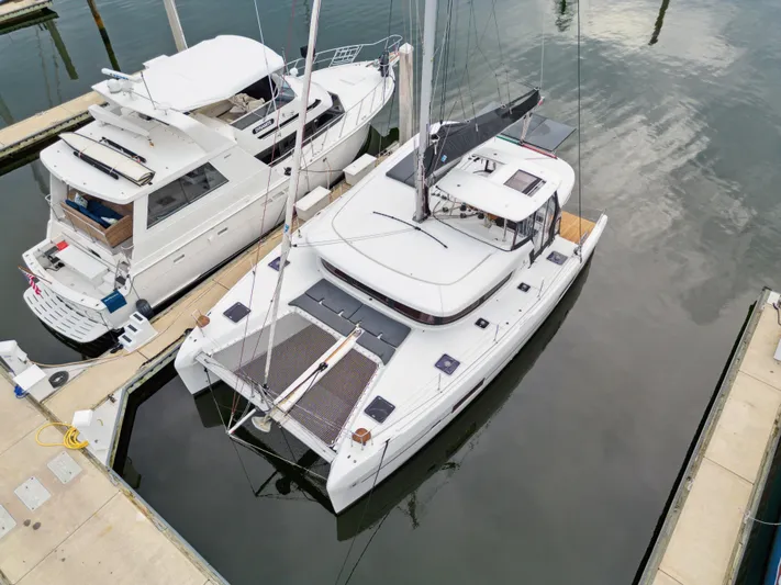 Neptune's Waters Yacht Photos Pics Aerial view of a 2019 Lagoon 42 yacht in the marina.