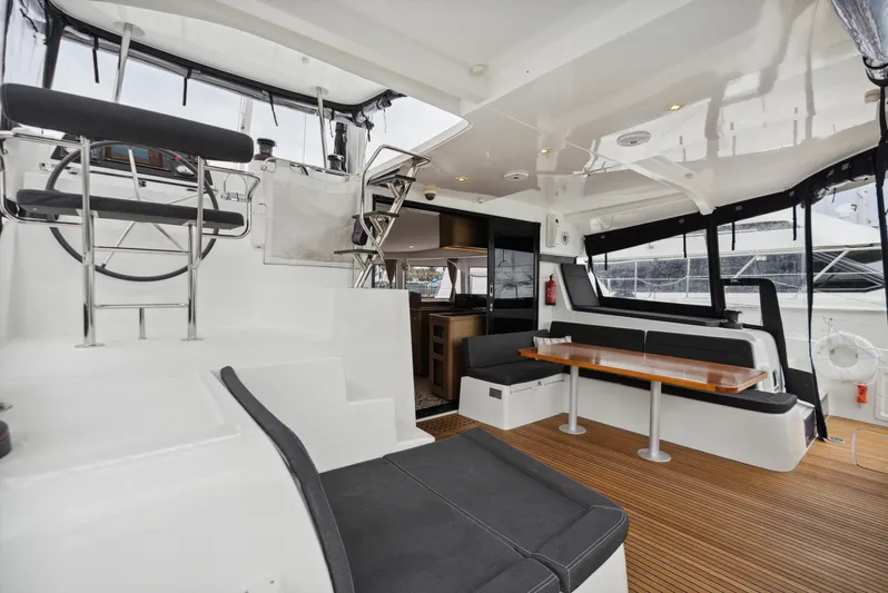 Neptune's Waters Yacht Photos Pics Interior of a 2019 Lagoon 42 yacht with modern amenities.