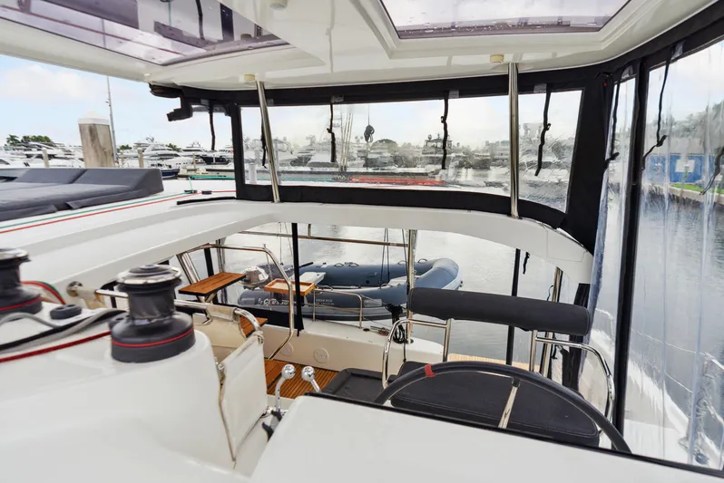 Neptune's Waters Yacht Photos Pics Interior view of 2019 Lagoon 42 yacht overlooking the harbor.