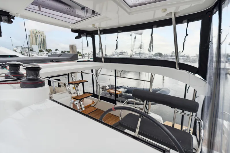 Neptune's Waters Yacht Photos Pics Interior view of a 2019 Lagoon 42 yacht in the harbor.