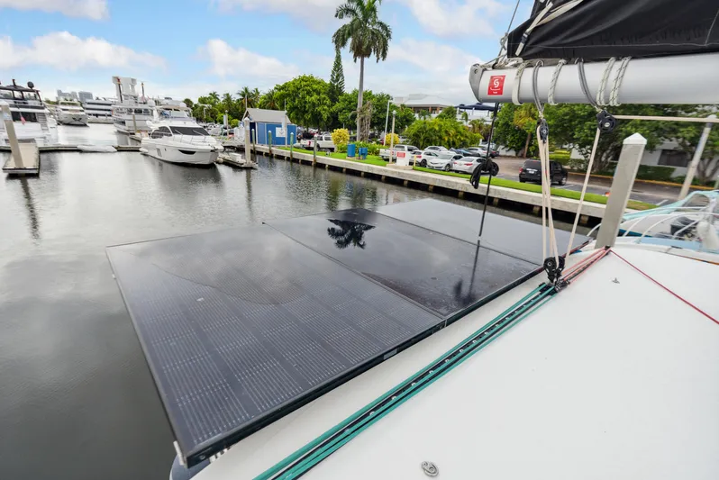 Neptune's Waters Yacht Photos Pics 2019 Lagoon 42 catamaran with solar panel in marina.