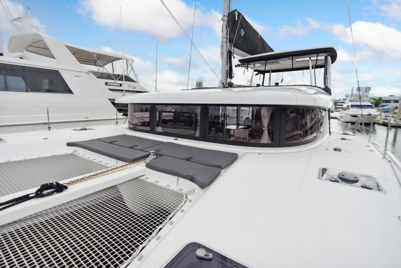 Neptune's Waters Yacht Photos Pics 2019 Lagoon 42 catamaran docked at marina.