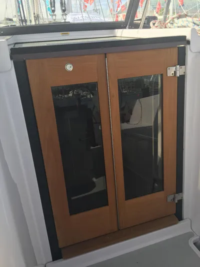 Catalina 425 In Stock Yacht Photos Pics 2024 Catalina 425 sailboat wooden cabin doors with glass panels.