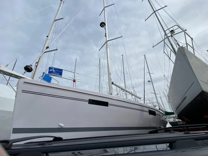 Catalina 425 In Stock Yacht Photos Pics 2024 Catalina 425 sailboat docked, showcasing sleek design and tall masts under a cloudy sky.