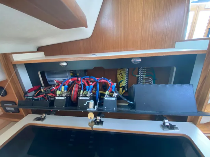 Catalina 425 In Stock Yacht Photos Pics Electrical panel inside a 2024 Catalina 425 yacht, showcasing wiring and components.