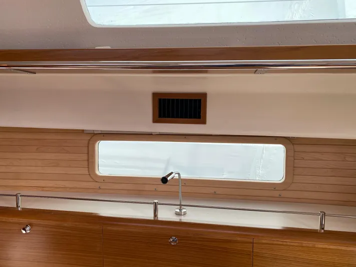 Catalina 425 In Stock Yacht Photos Pics Interior view of 2024 Catalina 425 sailboat, featuring a sleek wooden finish and modern window design.