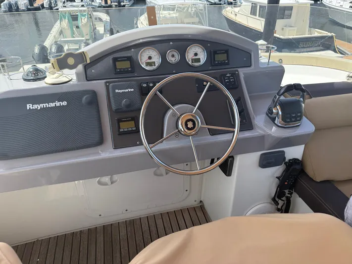 Wanderer Yacht Photos Pics Helm of 2016 Beneteau Swift Trawler 44 with Raymarine navigation system.