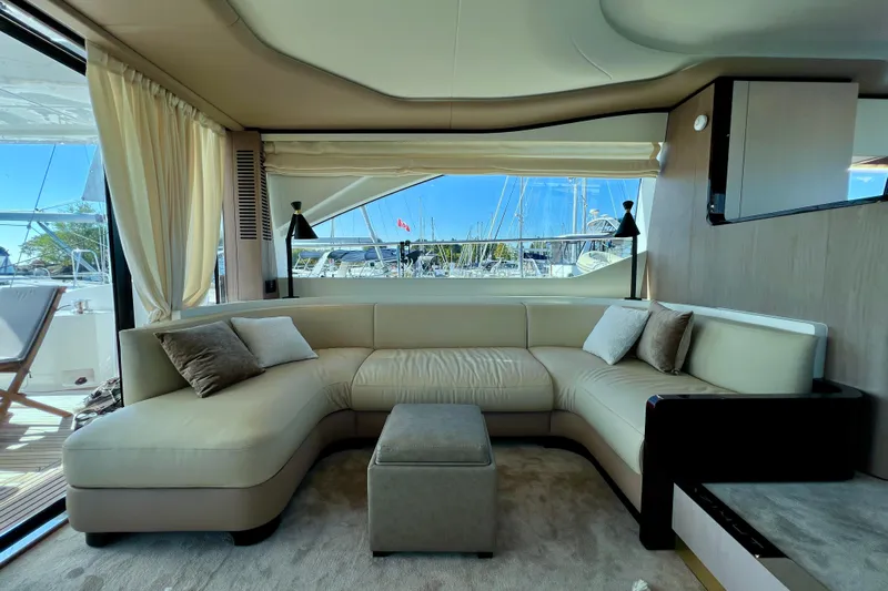  Yacht Photos Pics Luxurious interior of 2024 Azimut Fly 60 yacht with elegant seating and large windows.