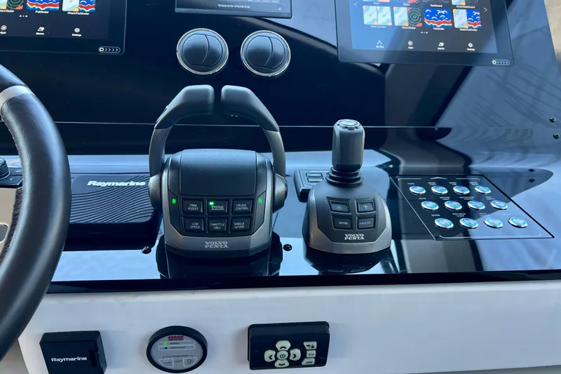  Yacht Photos Pics 2024 Azimut Fly 60 yacht control panel with advanced navigation and steering systems.