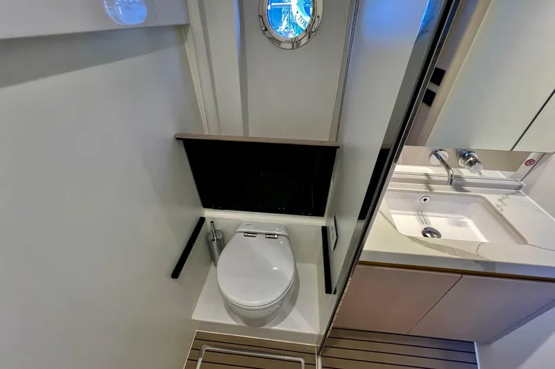  Yacht Photos Pics 2024 Azimut Fly 60 yacht bathroom with modern toilet and sink.