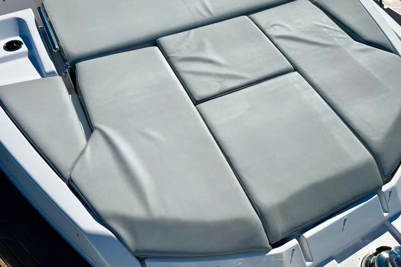  Yacht Photos Pics Luxurious sunbed on 2024 Azimut Fly 60 yacht, featuring sleek gray cushions.