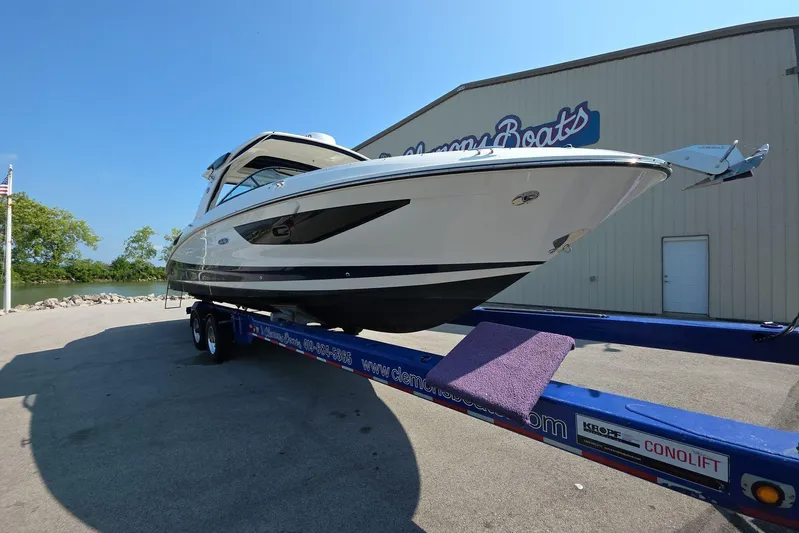  Yacht Photos Pics 2020 Sea Ray SLX 350 boat on trailer outside showroom.