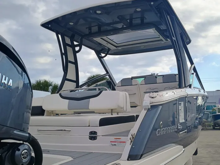 280-101 Yacht Photos Pics 2024 Chaparral 280 OSX boat with Yamaha engine, featuring sleek design and spacious seating.