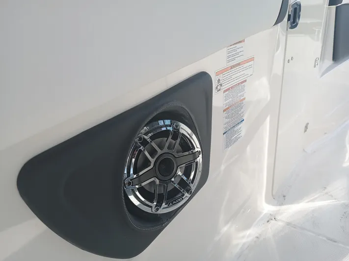 280-101 Yacht Photos Pics 2024 Chaparral 280 OSX boat speaker detail on white exterior.