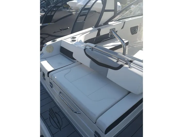 280-101 Yacht Photos Pics 2024 Chaparral 280 OSX boat interior with sleek seating and modern design.