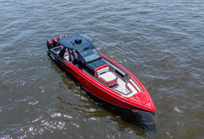  Yacht Photos Pics 2025 Cigarette 41 Nighthawk boat in vibrant red on open water.