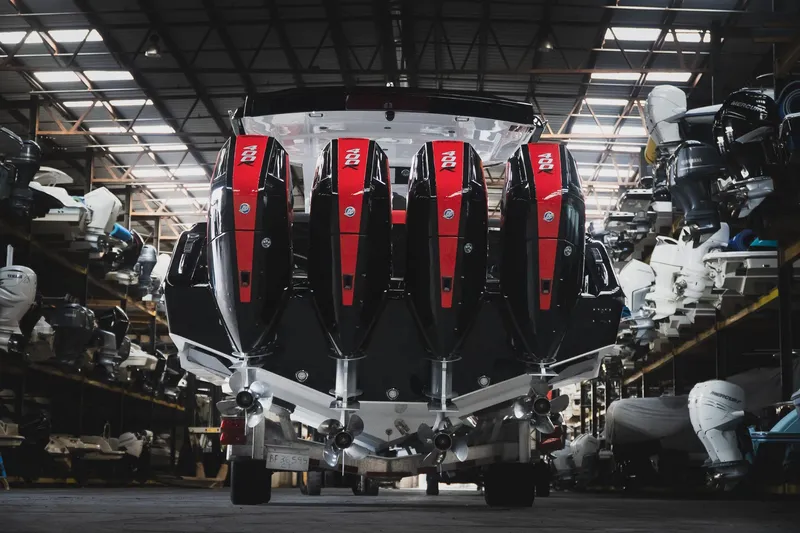  Yacht Photos Pics 2025 Cigarette 41 Nighthawk with quad engines in a boat storage facility.