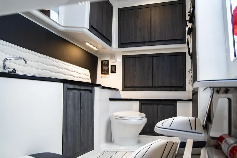  Yacht Photos Pics Interior of 2025 Cigarette 41 Nighthawk boat, featuring modern cabinetry and sleek design.