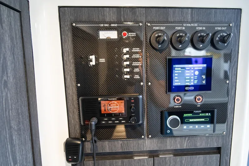  Yacht Photos Pics Control panel of 2025 Cigarette 41 Nighthawk boat with Garmin and Fusion systems.