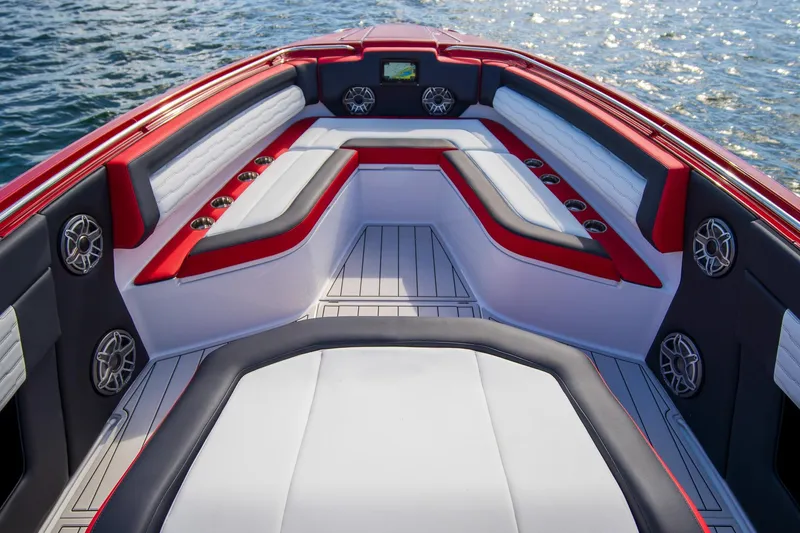  Yacht Photos Pics Luxurious seating on 2025 Cigarette 41 Nighthawk boat, featuring red and white upholstery.