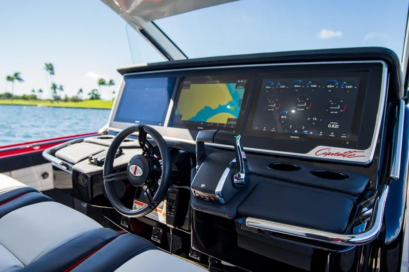  Yacht Photos Pics 2025 Cigarette 41 Nighthawk boat dashboard with advanced navigation and control systems.