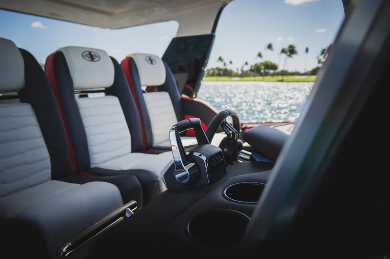  Yacht Photos Pics Interior of 2025 Cigarette 41 Nighthawk boat with luxurious seating and control panel.