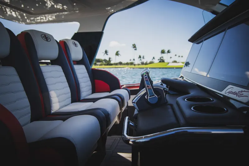  Yacht Photos Pics Interior of 2025 Cigarette 41 Nighthawk boat with luxury seating and control panel.