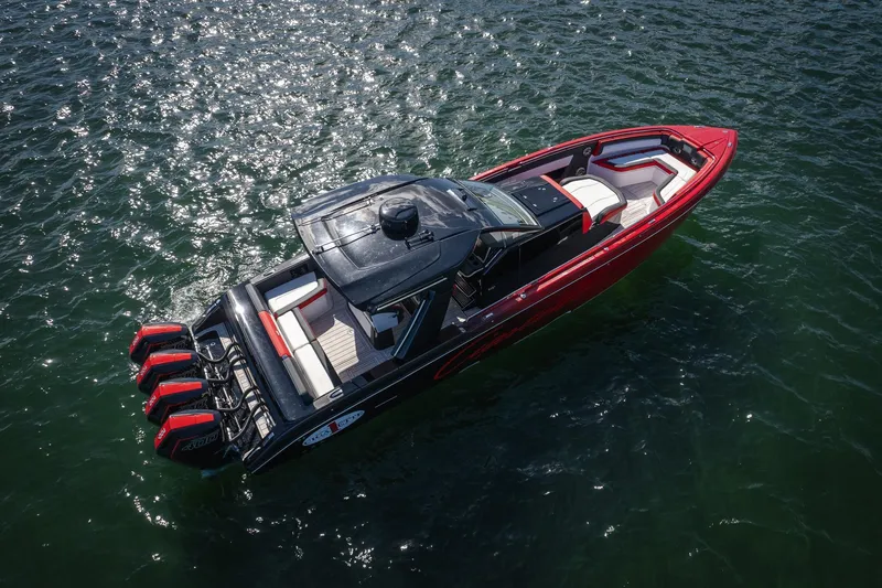  Yacht Photos Pics 2025 Cigarette 41 Nighthawk boat on water, featuring sleek design and powerful engines.