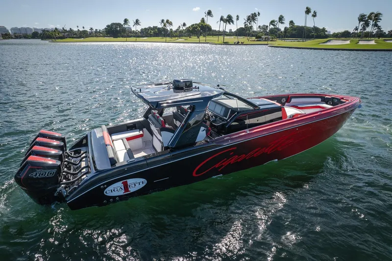  Yacht Photos Pics 2025 Cigarette 41 Nighthawk boat on water, featuring sleek design and powerful engines.