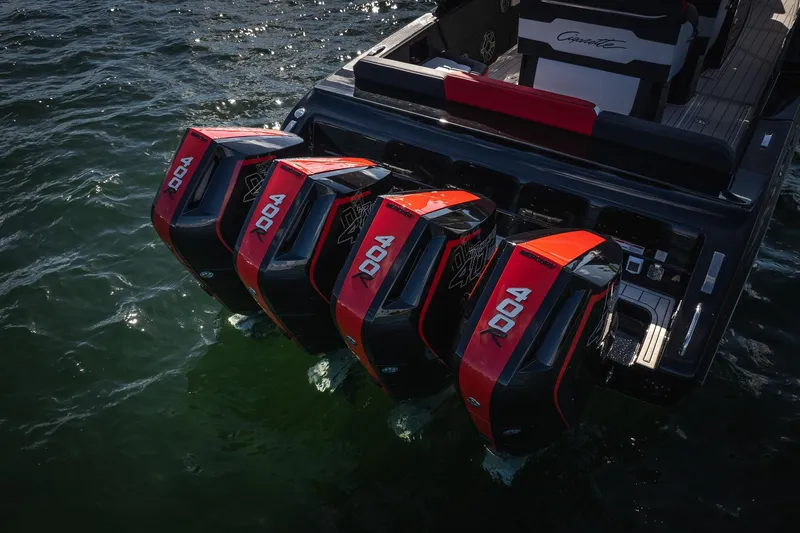  Yacht Photos Pics 2025 Cigarette 41 Nighthawk with four powerful outboard engines on water.