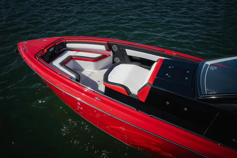  Yacht Photos Pics 2025 Cigarette 41 Nighthawk boat with sleek red design and luxurious seating on water.