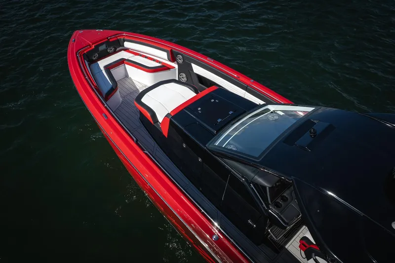  Yacht Photos Pics 2025 Cigarette 41 Nighthawk boat with sleek red and black design on water.