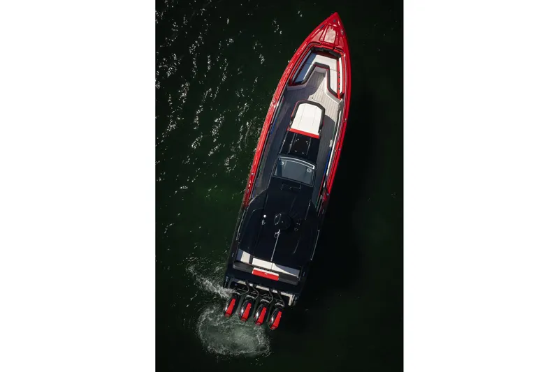  Yacht Photos Pics 2025 Cigarette 41 Nighthawk boat, aerial view, sleek design, vibrant red and black colors.