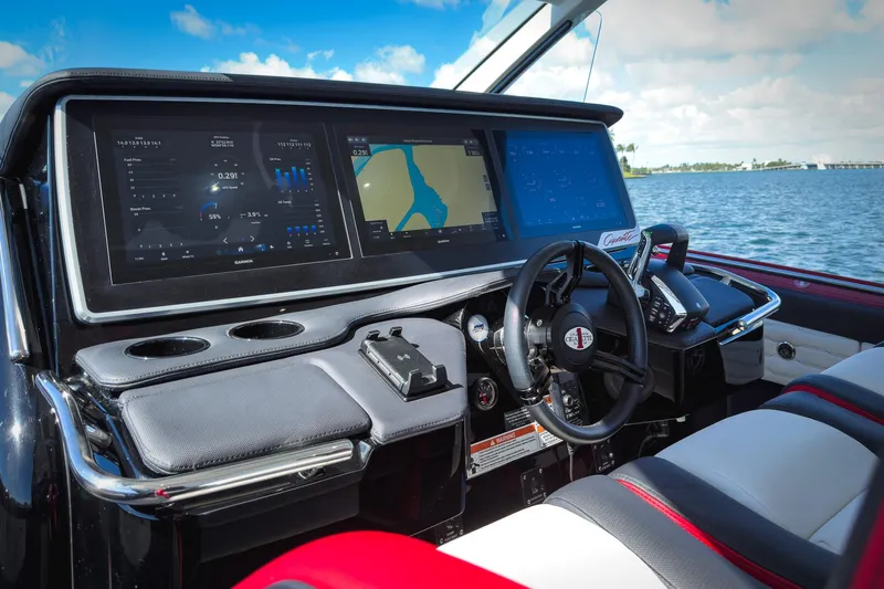  Yacht Photos Pics 2025 Cigarette 41 Nighthawk boat dashboard with advanced navigation screens and controls.