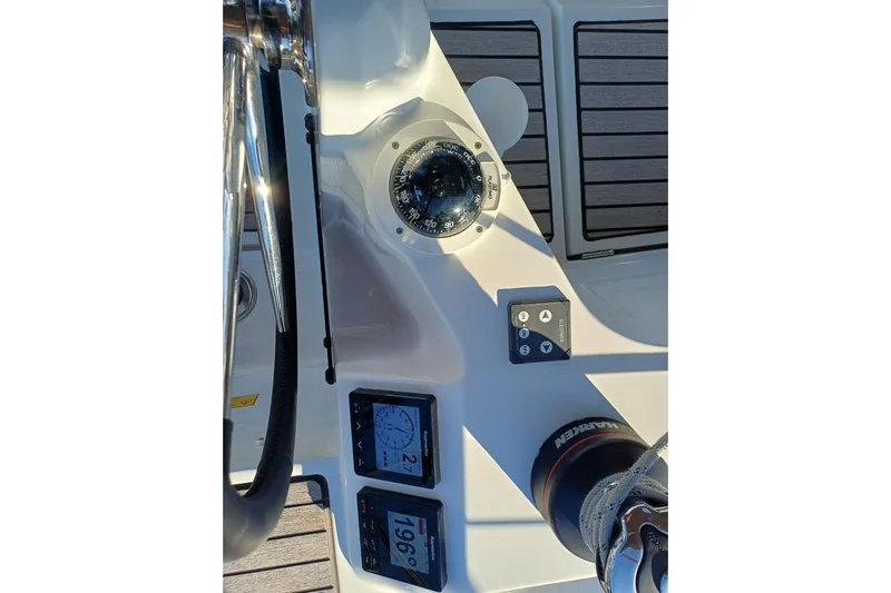 Prima Yacht Photos Pics Cockpit of 2024 Jeanneau Sun Odyssey 349, featuring steering wheel and navigation instruments.