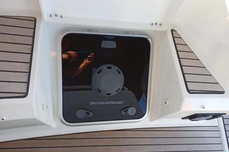 Prima Yacht Photos Pics 2024 Jeanneau Sun Odyssey 349 deck hatch with teak flooring detail.
