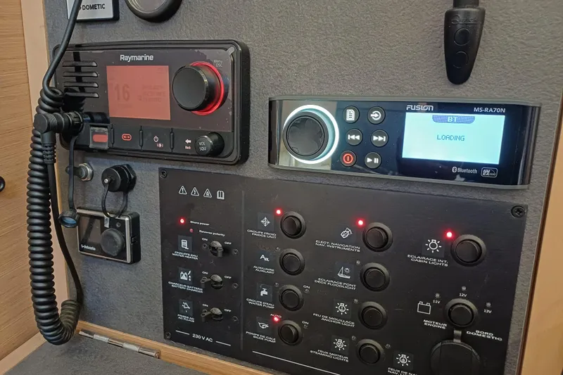 Prima Yacht Photos Pics Control panel of 2024 Jeanneau Sun Odyssey 349 with navigation and audio systems.