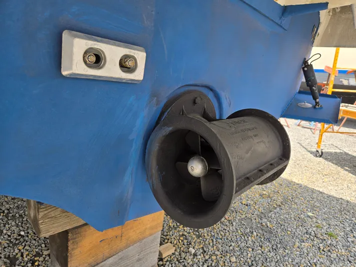First Mates Yacht Photos Pics 2015 Beneteau Swift Trawler 44 bow thruster detail, blue hull, on dry dock.