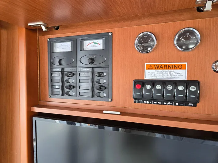 First Mates Yacht Photos Pics Control panel inside 2015 Beneteau Swift Trawler 44, featuring gauges and switches.