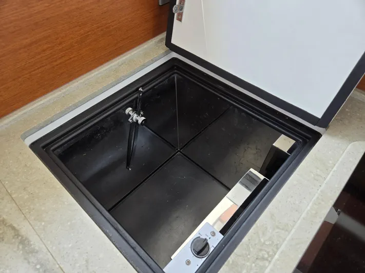 First Mates Yacht Photos Pics Open storage compartment on 2015 Beneteau Swift Trawler 44 yacht.