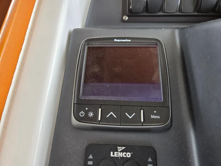 First Mates Yacht Photos Pics Raymarine display on 2015 Beneteau Swift Trawler 44 dashboard with Lenco controls.