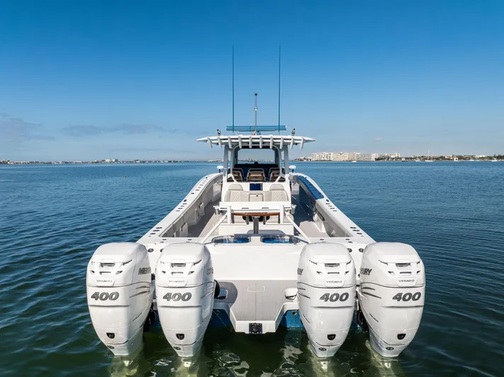  Yacht Photos Pics 2022 Freeman 43 boat with four Mercury 400 engines on calm water.