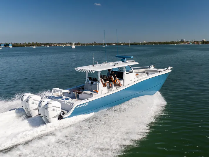  Yacht Photos Pics 2022 Freeman 43 boat cruising on a sunny day in open water.