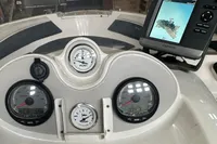 Control panel of a 2007 Quicksilver 600 Commander boat with Garmin GPS display.