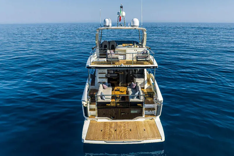  Yacht Photos Pics Luxury Absolute 52 FLY yacht cruising on open sea, 2026 model.